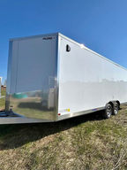 102x20 wide-body aluminum enclosed trailer with 10K GVWR, ramp door, and maximum cargo capacity.
