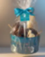 Lata de Pascua ilustrada con conejo de chocolate belga 75 g, huevos y figuras de chocolate, presentada en envoltorio transpar