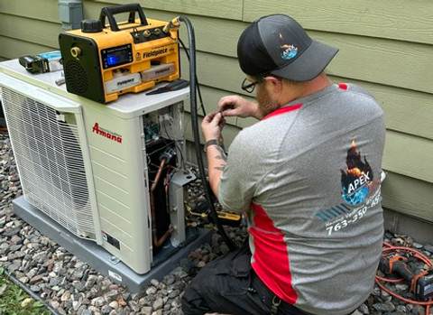 Apex Mechanical technician performing HVAC service in Central Minnesota