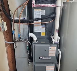 High-efficiency furnace in a Minnesota home ready for annual furnace maintenance