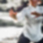 Woman practicing Tai Chi Quan in the par