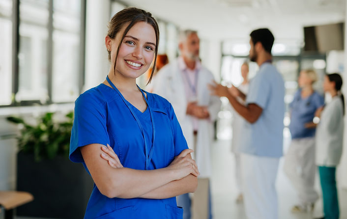 Portrait of young woman nurse at hospita