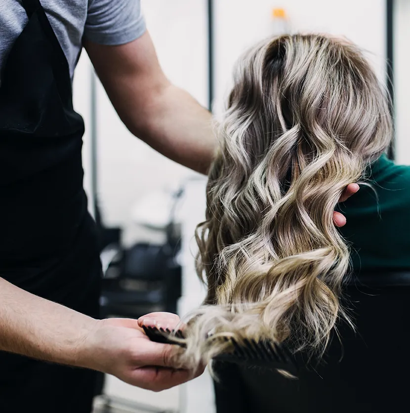 Professional hairstyling with soft waves created at Revive Spa & Lash Lounge, your go-to Southern Pines spa for salon-quality cuts and color.