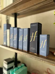Hydrinity skincare display at Revive Spa & Lash Lounge, featuring top skin products used in Southern Pines facials