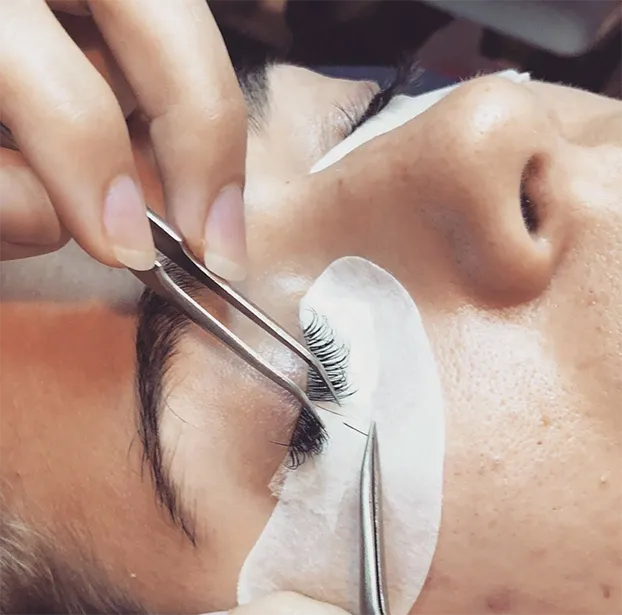 Close-up of lash extension application at Revive Spa & Lash Lounge, where expert lash artists deliver stunning results in Southern Pines.