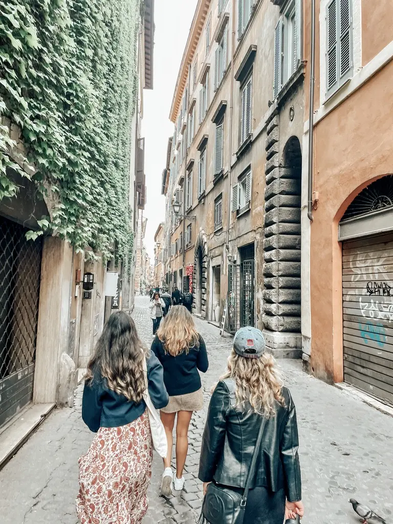 friends walking in italy streets