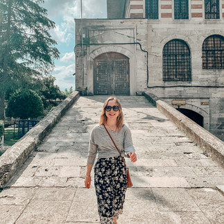 Girl smiling in Turkey outside temple