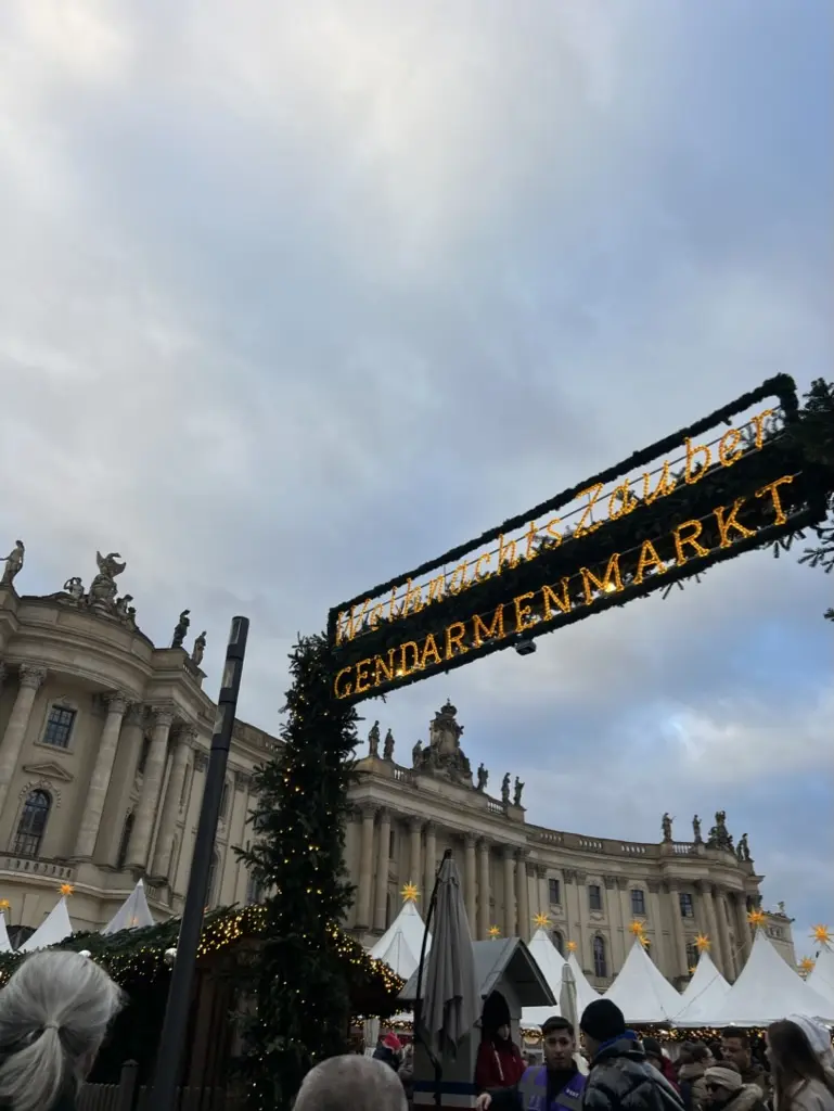 Berlin Christmas Market entrance view with building in background