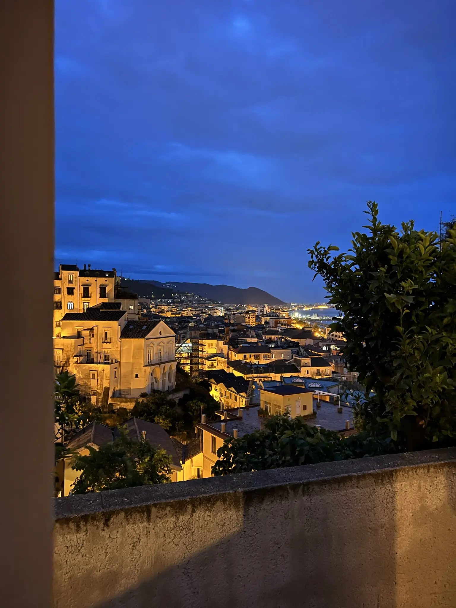 view from balcony at night in salerno italy