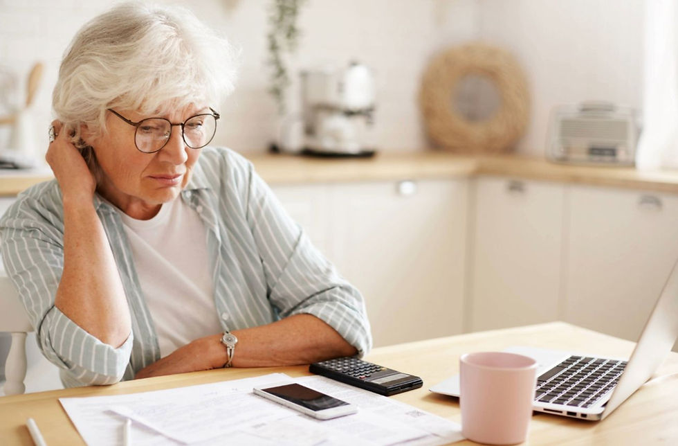 people-age-technology-finances-depressed-unhappy-retired-woman-paying-domestic-bills-onlin