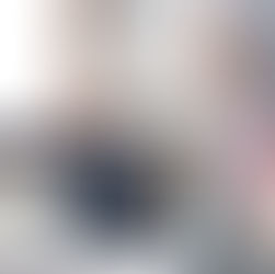 Older couple preparing their luggage before a trip