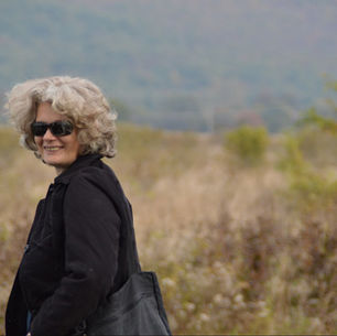 Senior woman walking outdoors independently and confidently