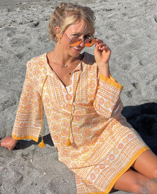 Cameo in soleil tunic on sand.jpeg
