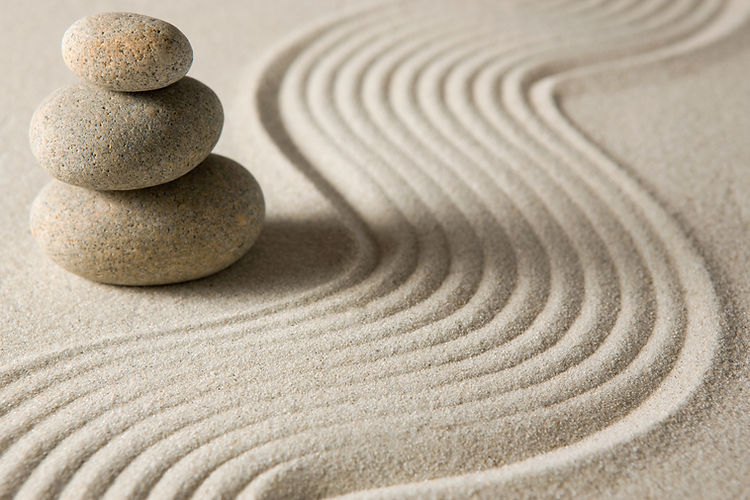 Balanced stones representing calm, focus and clinical hypnosis