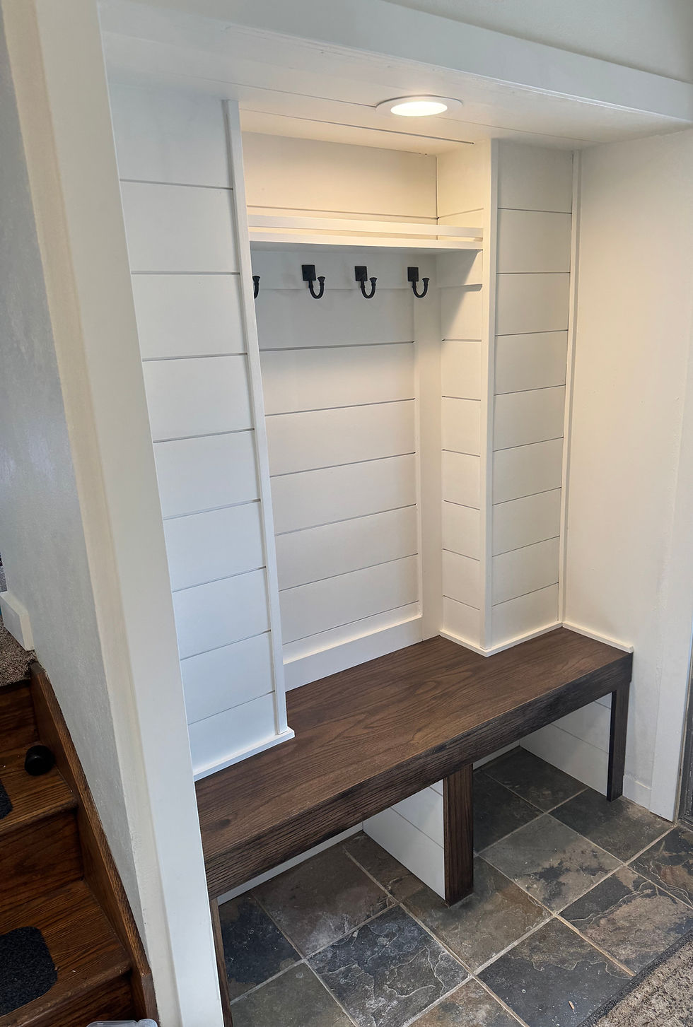 This drop zone in Oregon added warmth, dimension, and much-needed space for coats, shoes, and bags.