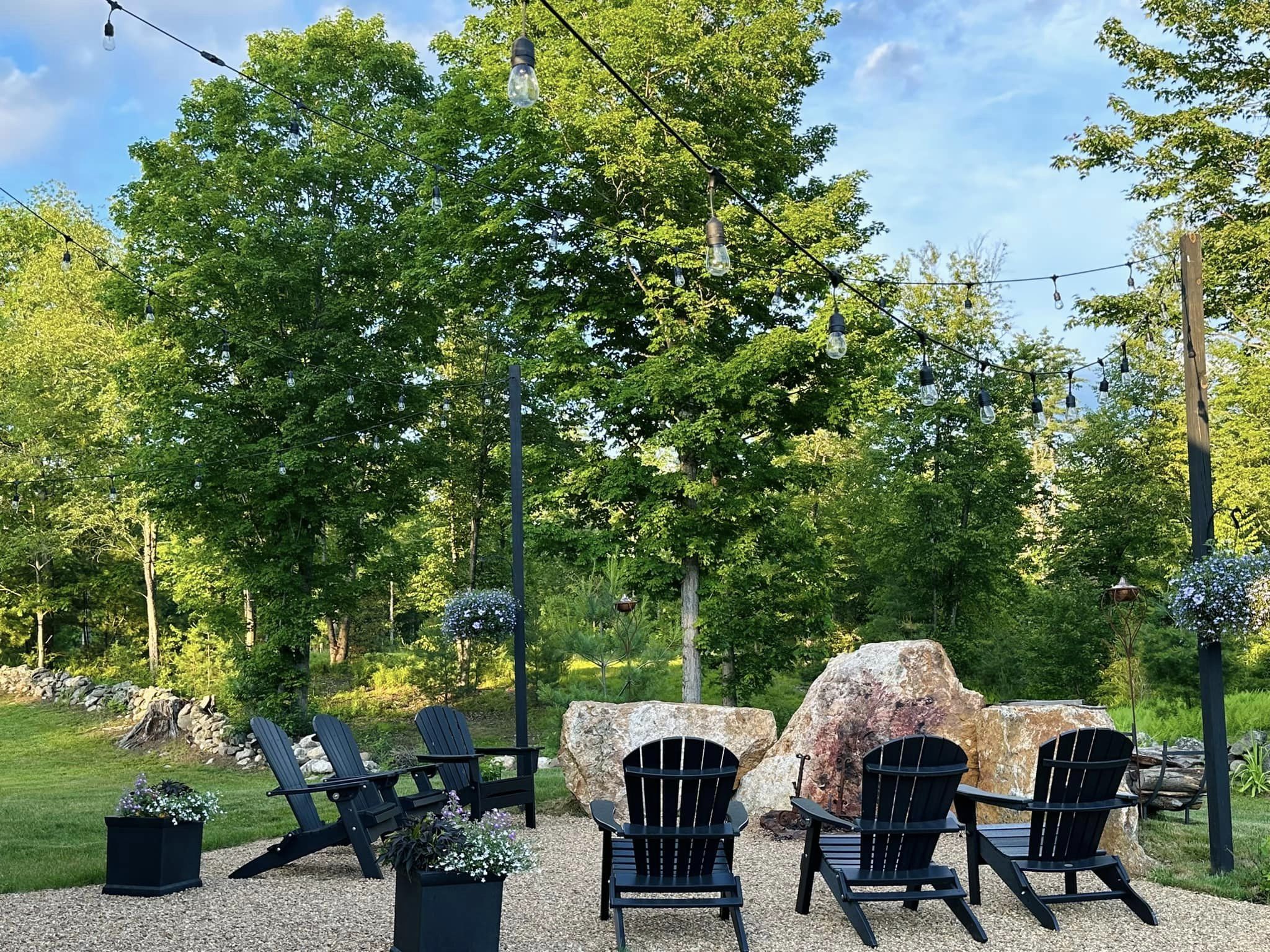 Fire pit area with Adirondack chairs