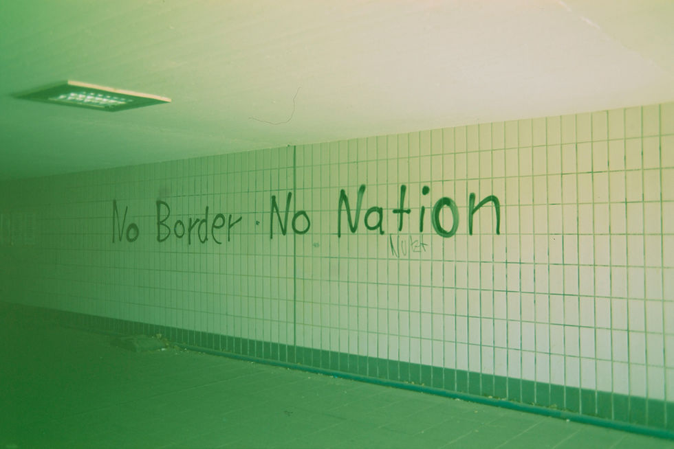 Photo of grafiti writing No border no nation