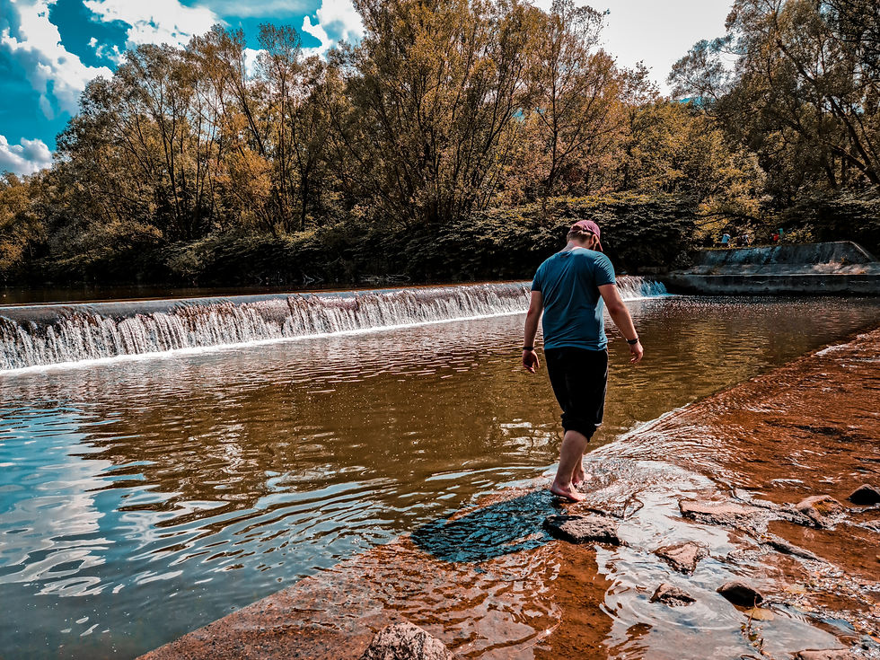 man crossing the lake