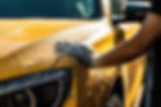 vecteezy_close-up-man-washing-her-car-in-a-self-service-car-wash_23980940.jpg