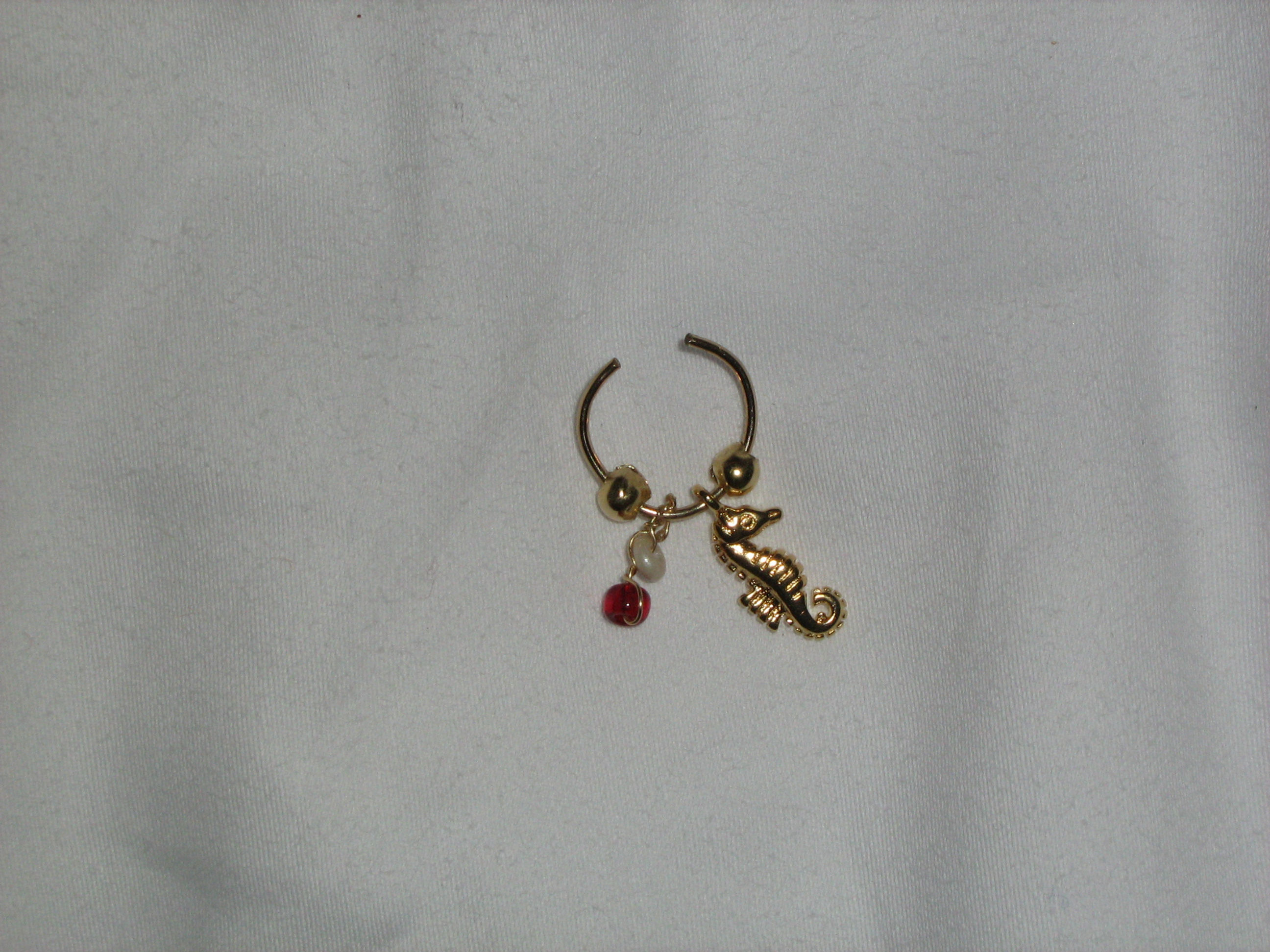 Conch ear cuff with a seahorse