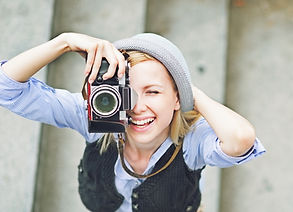 Girl with camera Taking a Photo
