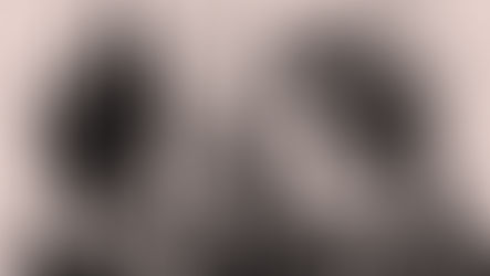 Head of woman with cybernetic implants and wires. Planets and a dark castle loom in background