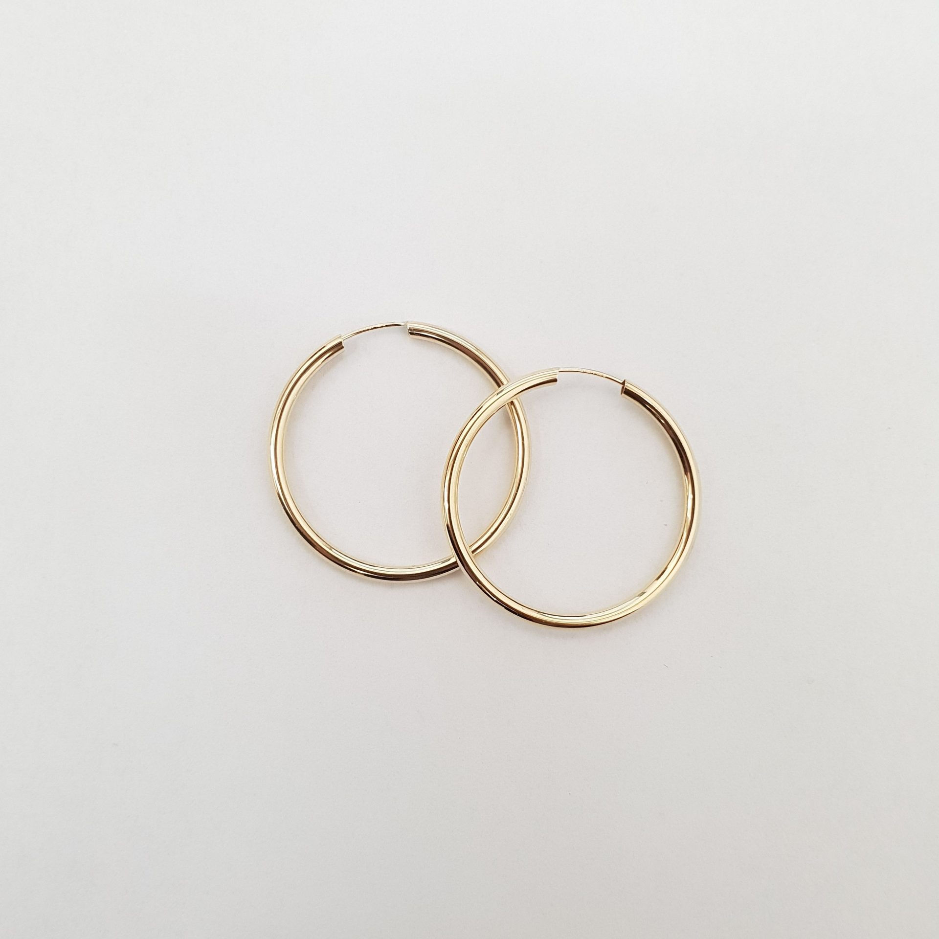 עגיל זהב חישוק גמיש קוטר 30 מ"מ זהב צהוב