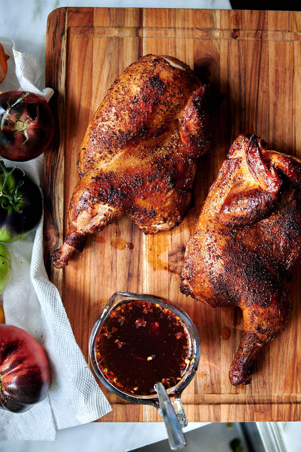 Smoked-chicken-halves-served-with-vinegar-sauce