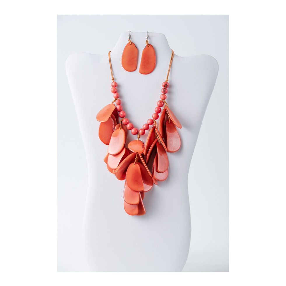 Handmade cascading tagua statement necklace and earrings set in orange tones