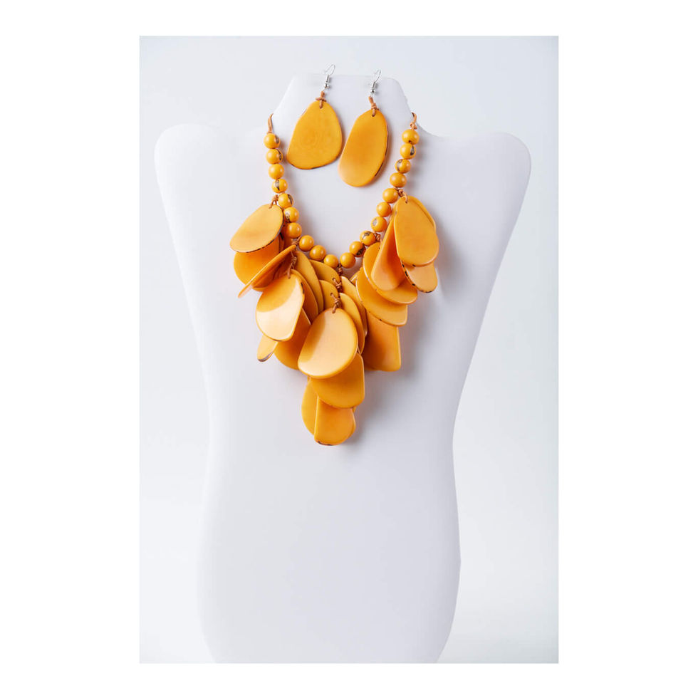 Handmade cascading tagua statement necklace and earrings set in yellow tones
