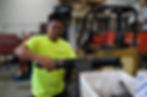 diesel mechanic repairing truck cayman