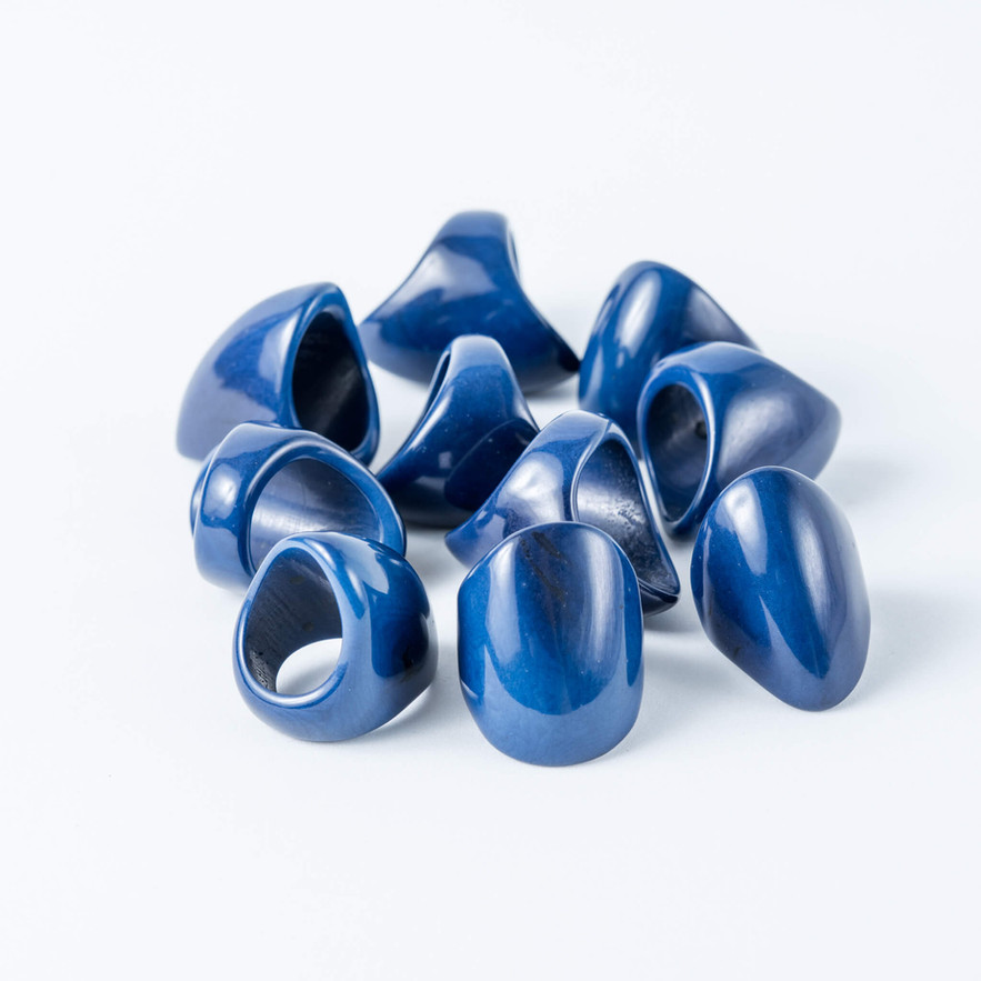 group of elegant lightweight, organic, natural, Navy blue  curved tagua rings, handmade by taguartsy 