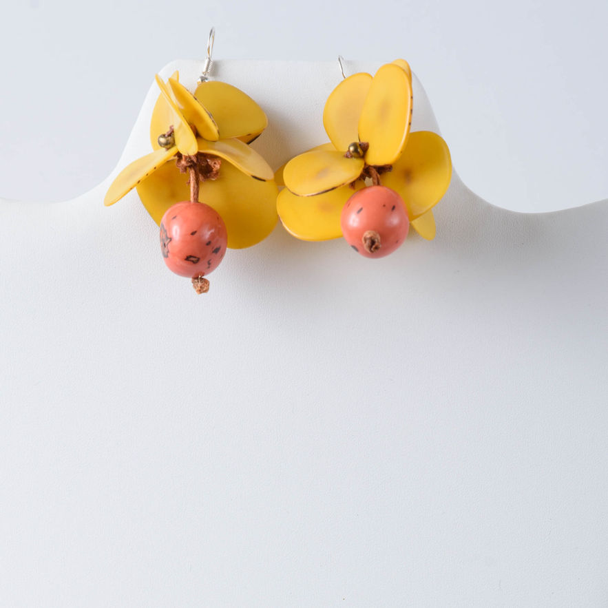 Yellow floral tagua earrings with coral bead. comfortable, lightweight, handcrafted, organic fashion jewelry made from tagua nut.