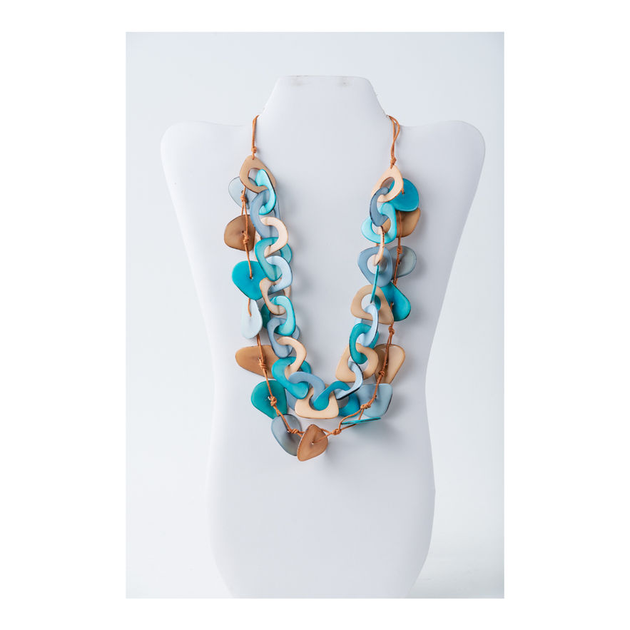 Turquoise and wooden necklace displayed on a white mannequin, TaguArtsy.