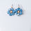Thumbnail: Powder Blue  Tagua flower earrings. 