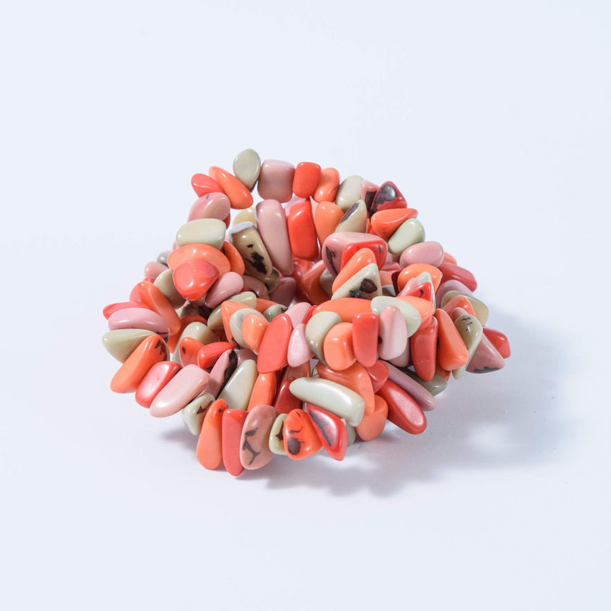 Multicolored Stackable Tagua Bracelet with coral and pink chips. everyday fashion. lightweight, organic, natural and handmade, stylish and chic, beautiful but afordable, flexible. Made with love by natue. Friendship gift