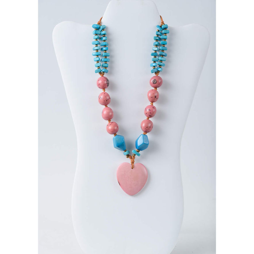 Pink and blue beaded necklace, heart pendant, on white display
