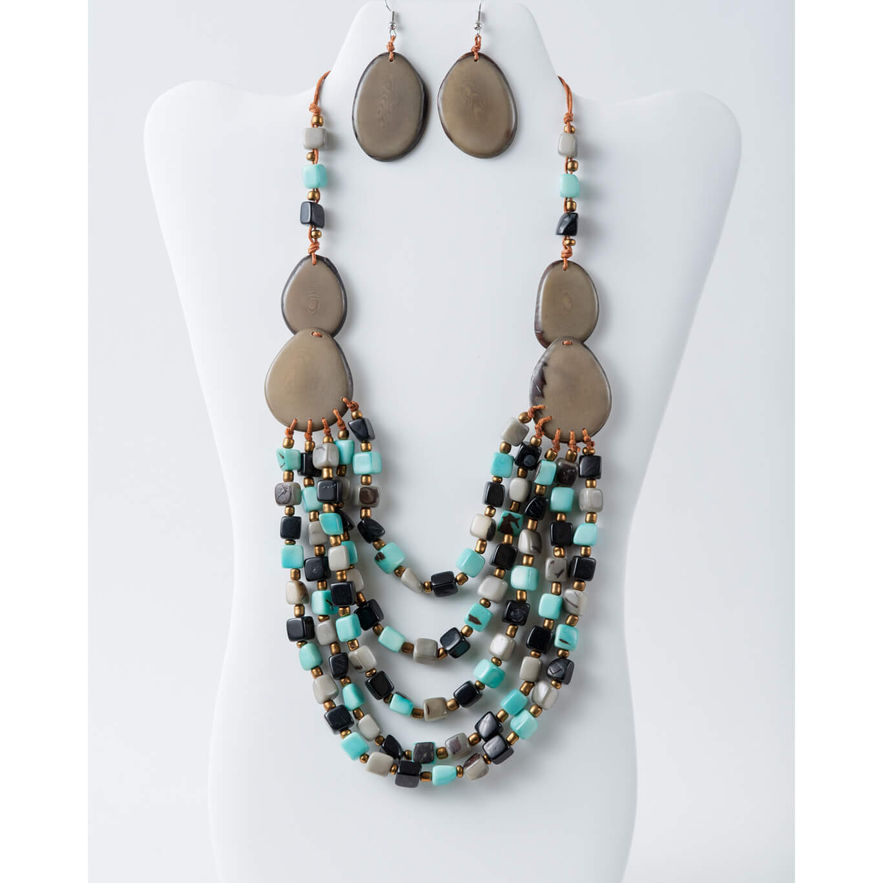 Necklace and earring set on display; Nova Single-Color Tagua Bead Earrings – Handmade Triangle Earrings; TaguArtsy