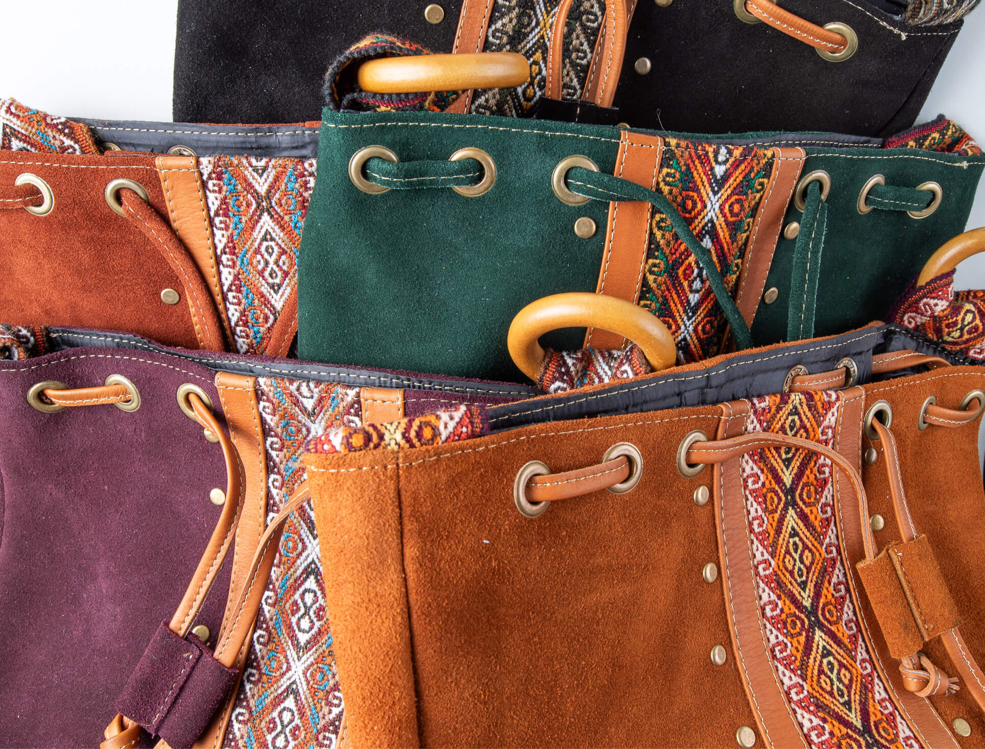 Artisan suede drawstring bags