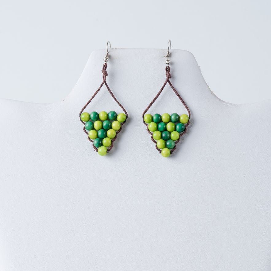 Green triangle earrings on display; Nova Multicolored Tagua Bead Earrings – Eco-Friendly Triangle Earrings; TaguArtsy