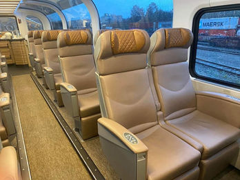 Rocky Mountaineer Train Seats - The seats are spacious, reclining leather chairs with heated seat functions, adjustable lumbar support and individual climate controls.