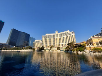 The Bellagio Las Vegas: The Bellagio Las Vegas is an ultra-luxury resort inspired by the Lake Como town of Bellagio in Italy. It is widely considered the crown jewel of the Las Vegas Strip, known for its timeless elegance and high-end attractions. A massive, 8.5-acre lake featuring a choreographed water, light and music show that is the most famous free attraction in the city.