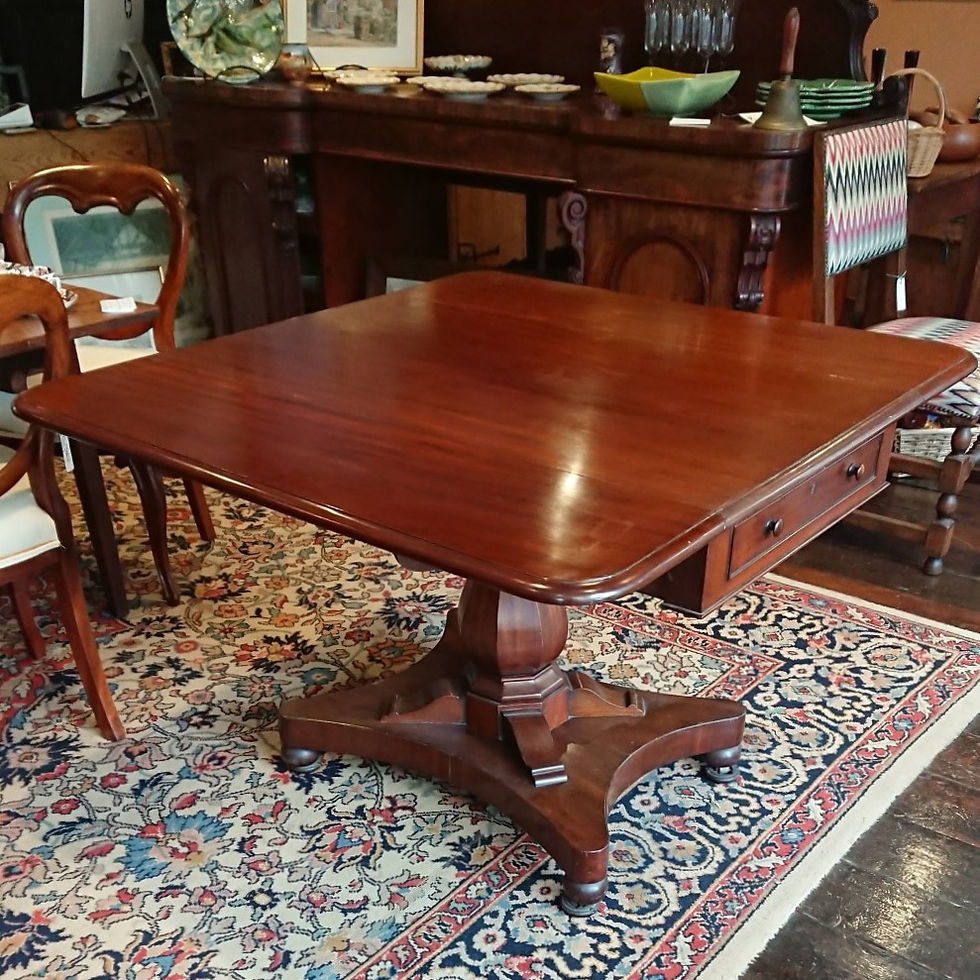 A Regency mahogany drop-leaf pedestal table