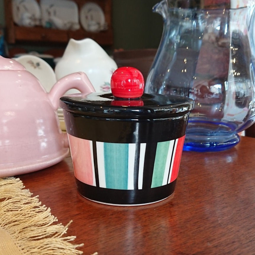 Thumbnail: Jersey Pottery black and bright-coloured striped lidded pot