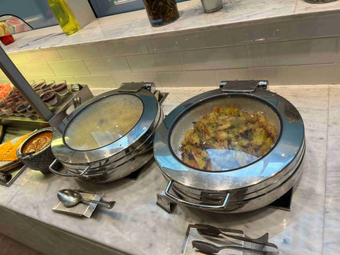 Das Buffet im Aleph Doha Residences, Curio Collection by Hilton
