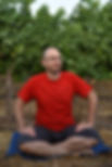 Ori keren sitting on the ground smiling