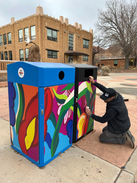 vibrant floral design on a waste bin