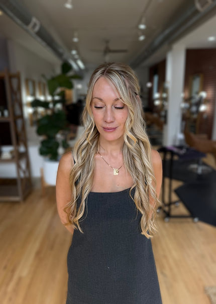 Dimensional blonde balayage with curls by TRU Hair Salon luxury salon Colorado Springs