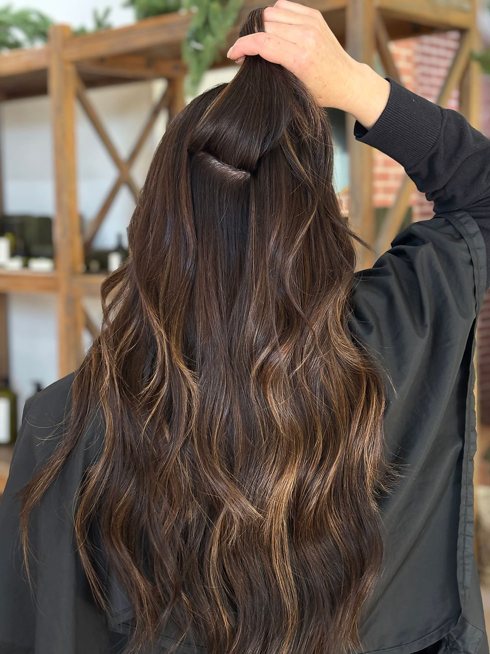 Seamless hair extensions Colorado Springs — dimensional brunette balayage at TRU Hair Salon