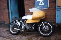 Unity Tickle Manx, outside the shop